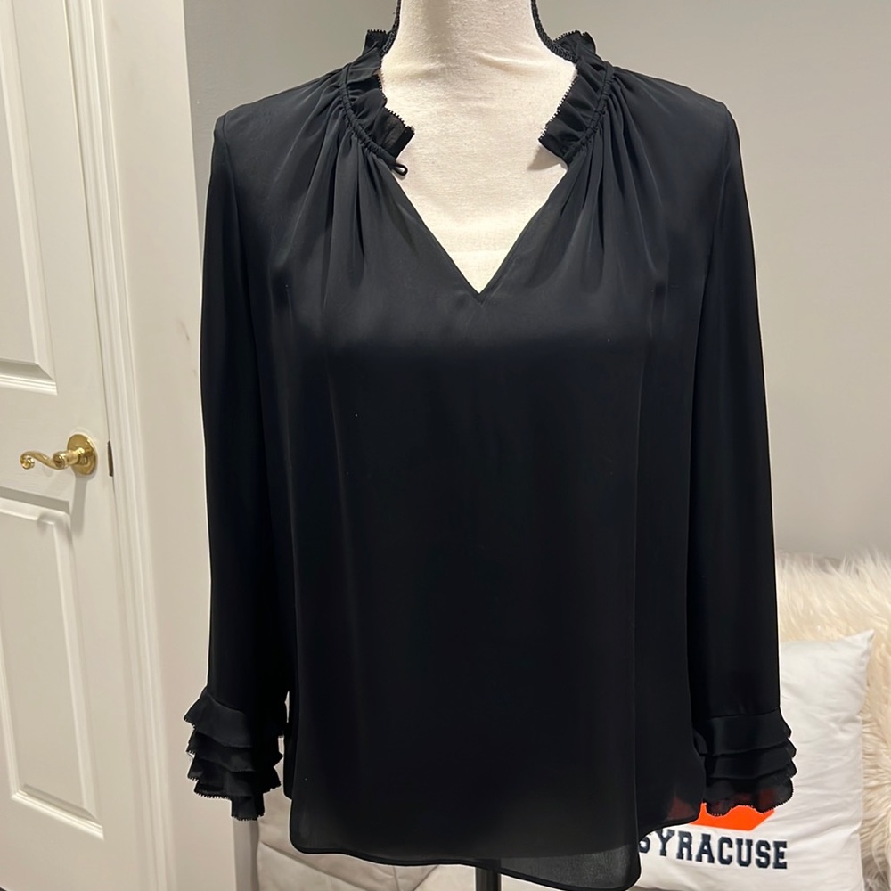 Great staple blouse for your closet. 100% silk.